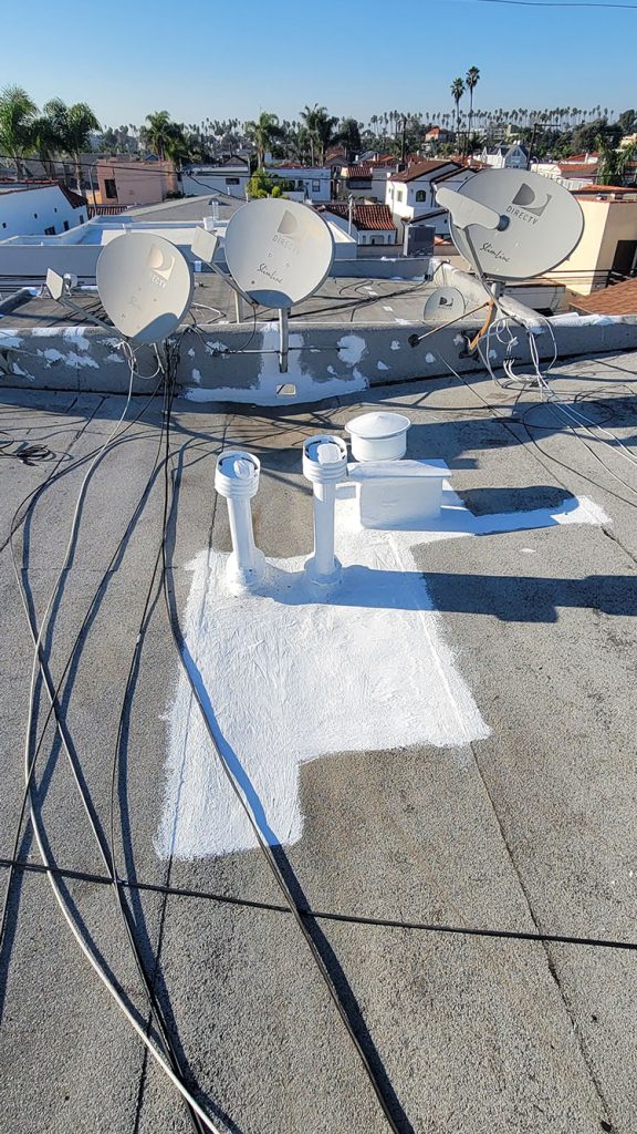 Commercial roofing contractor servicing industrial warehouse in Long Beach California